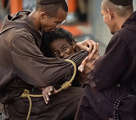 Friars hugging a person on the street